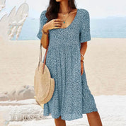 Damen Sommerkleid mit V-Ausschnitt und Taschen – leichtes Midi-Kleid in Loose-Fit