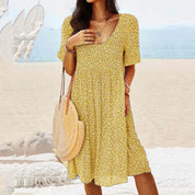 Damen Sommerkleid mit V-Ausschnitt und Taschen – leichtes Midi-Kleid in Loose-Fit