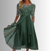 Elegantes Midi-Kleid mit Spitzenoberteil – feminine Leichtigkeit und zeitloser Stil