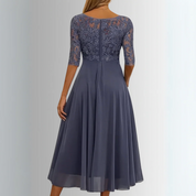 Elegantes Midi-Kleid mit Spitzenoberteil – feminine Leichtigkeit und zeitloser Stil