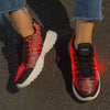 Funkelnde leuchtende Schuhe